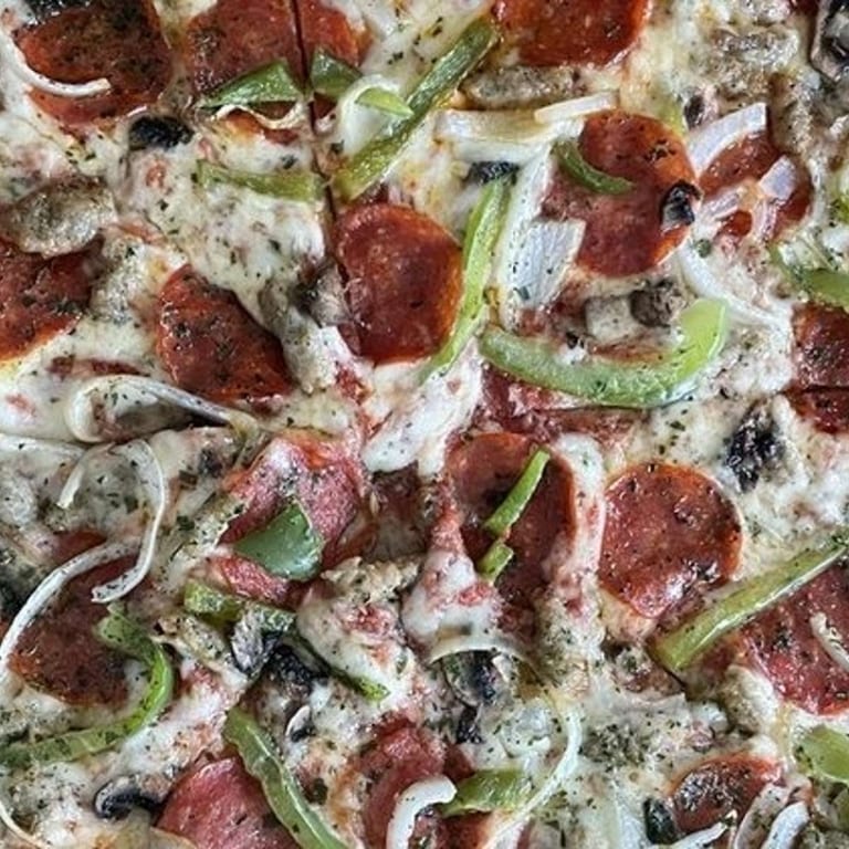 Indulge in Our Supreme Pizza